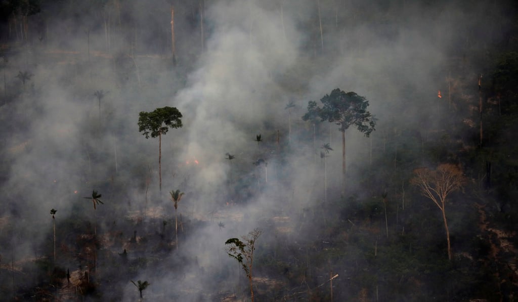 Smoke billows during a fire in an area of the Amazon rainforest near Porto Velho on September 17. Photo: Reuters Smoke billows during a fire in an area of the Amazon rainforest near Porto Velho on September 17. Photo: Reuters