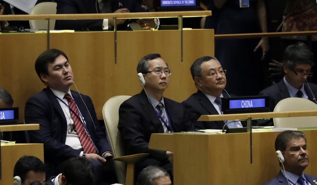 Members of the China UN delegation listen to Trump’s remarks on Tuesday. Photo: AP
