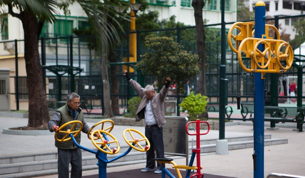 Two elderly men exercising. The physical and social environments of elderly people affect their quality of life and susceptibility to disease. Photo: Alamy
