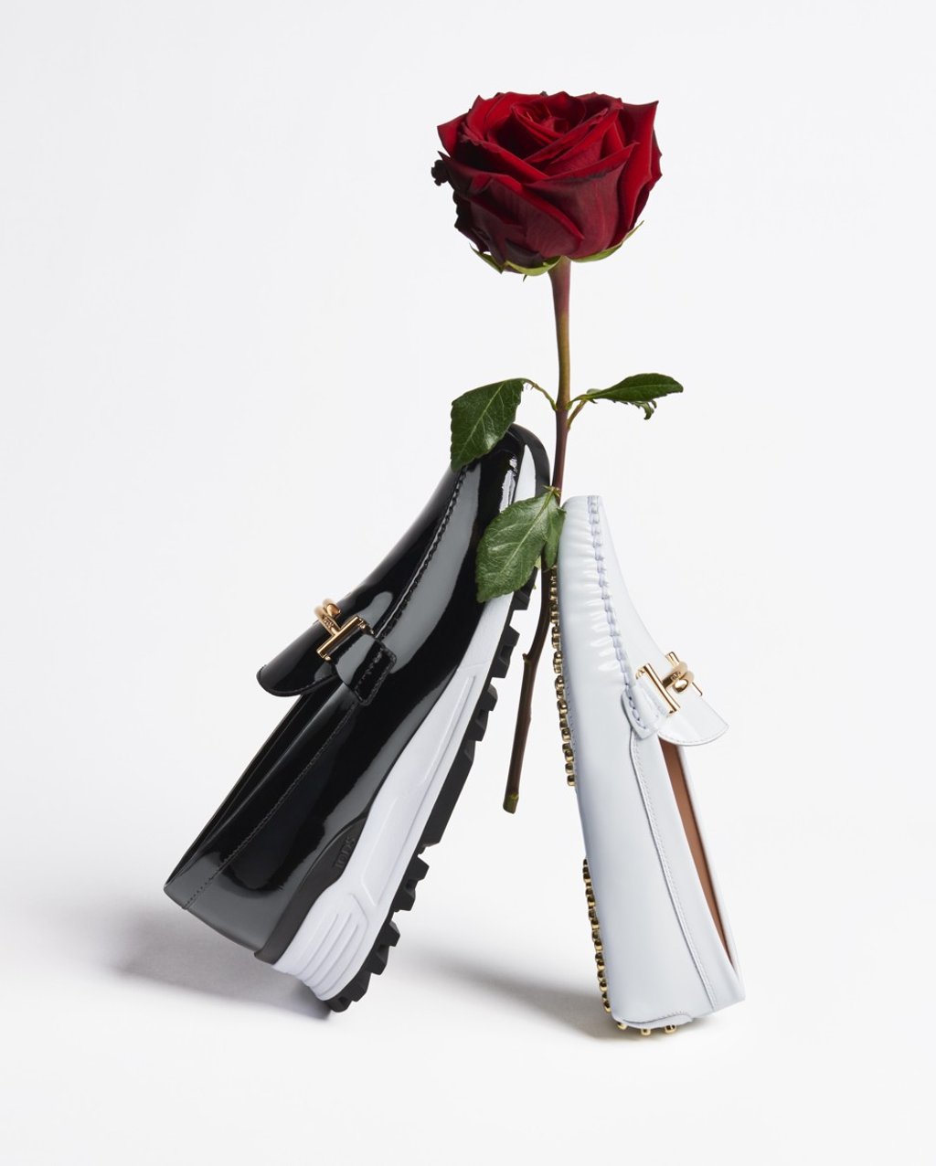 The Happy Moments collection reinterprets Tod’s iconic driving shoe, a classic moccasin with a signature rubber pebble outsole. The Happy Moments collection reinterprets Tod’s iconic driving shoe, a classic moccasin with a signature rubber pebble outsole.