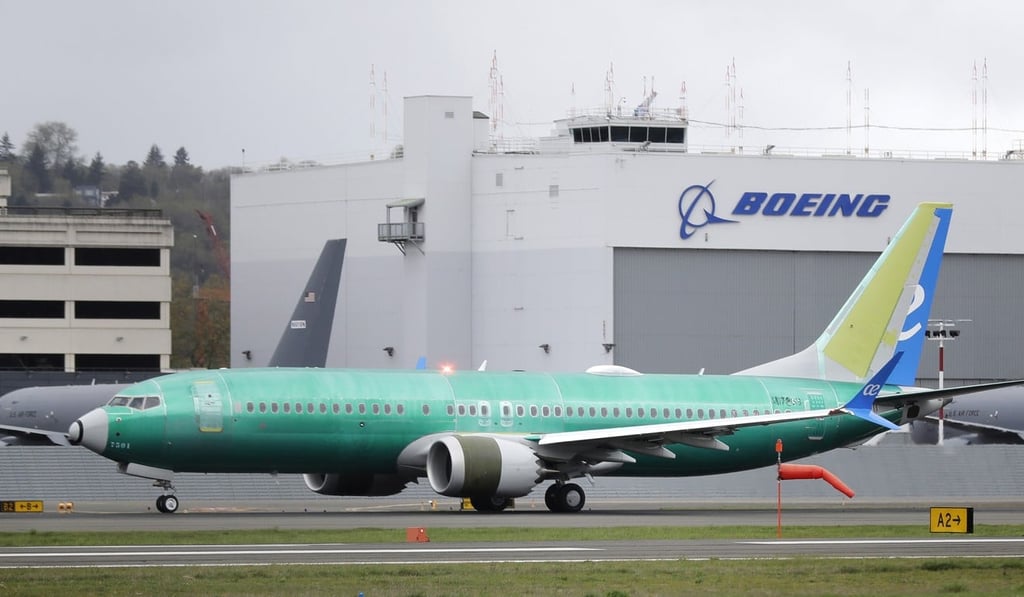 A Boeing 737 MAX 8 airplane rolls toward takeoff before a test flight at Boeing Field in Seattle. Photo: AP Photo A Boeing 737 MAX 8 airplane rolls toward takeoff before a test flight at Boeing Field in Seattle. Photo: AP Photo