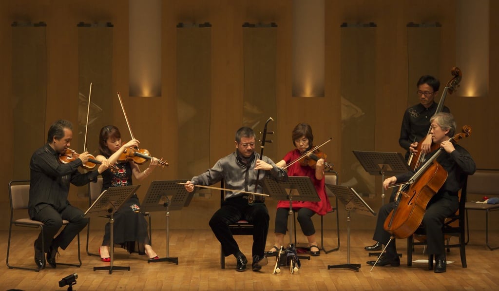 Chinese erhu virtuoso Xu Ke (front centre) and members of the Tokyo String Quintet, who will be playing together in Hong Kong in December. Chinese erhu virtuoso Xu Ke (front centre) and members of the Tokyo String Quintet, who will be playing together in Hong Kong in December.