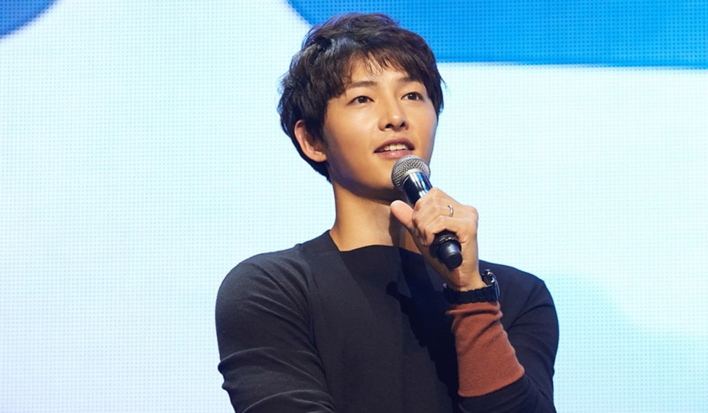Song Joong-ki at his 10th anniversary fan meeting in 2018.