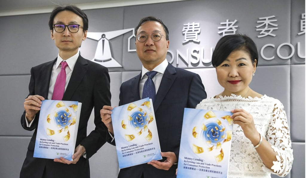 The Consumer Council’s Samuel Chan (left), Paul Lam and Gilly Wong with the watchdog’s report on borrowing practices. Photo: Nora Tam