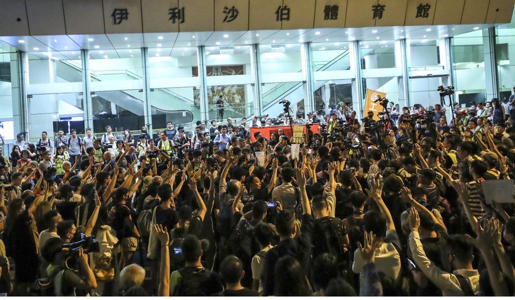Protesters gather outside Queen Elizabeth Stadium. Photo: Sam Tsang