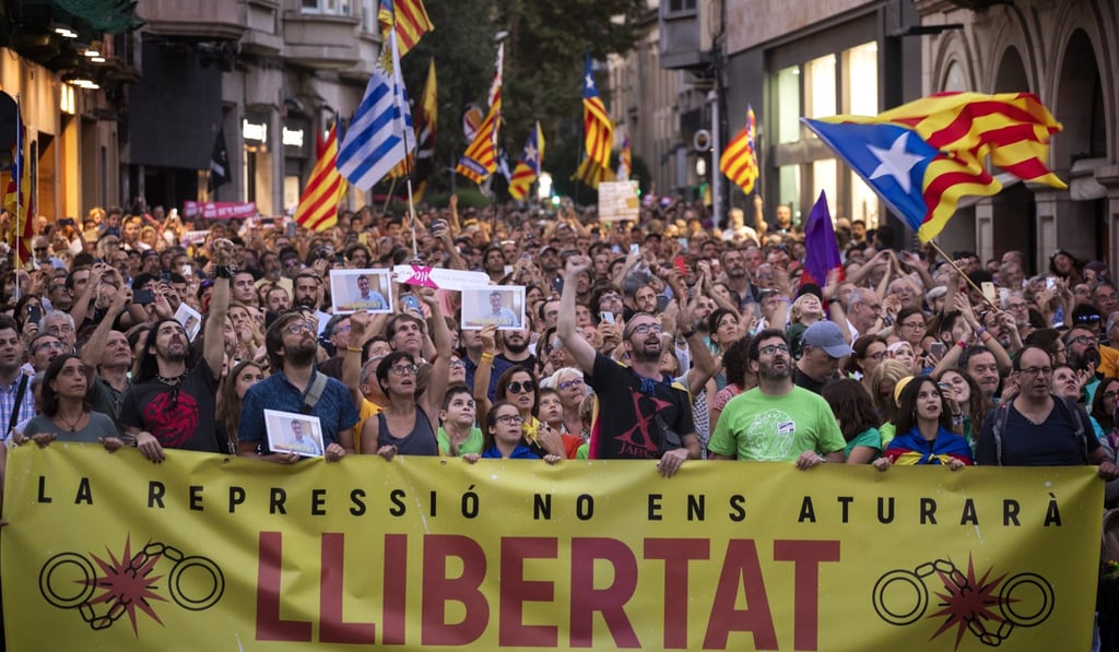 Pro-independence demonstrators march during a protest in Sabadell. Photo: AP Photo Pro-independence demonstrators march during a protest in Sabadell. Photo: AP Photo