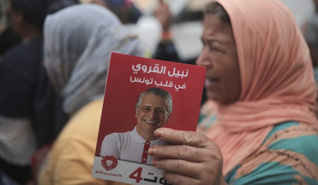 Supporters of Karoui chant for his freedom in Nabeul, west of Tunis. Photo: AP
