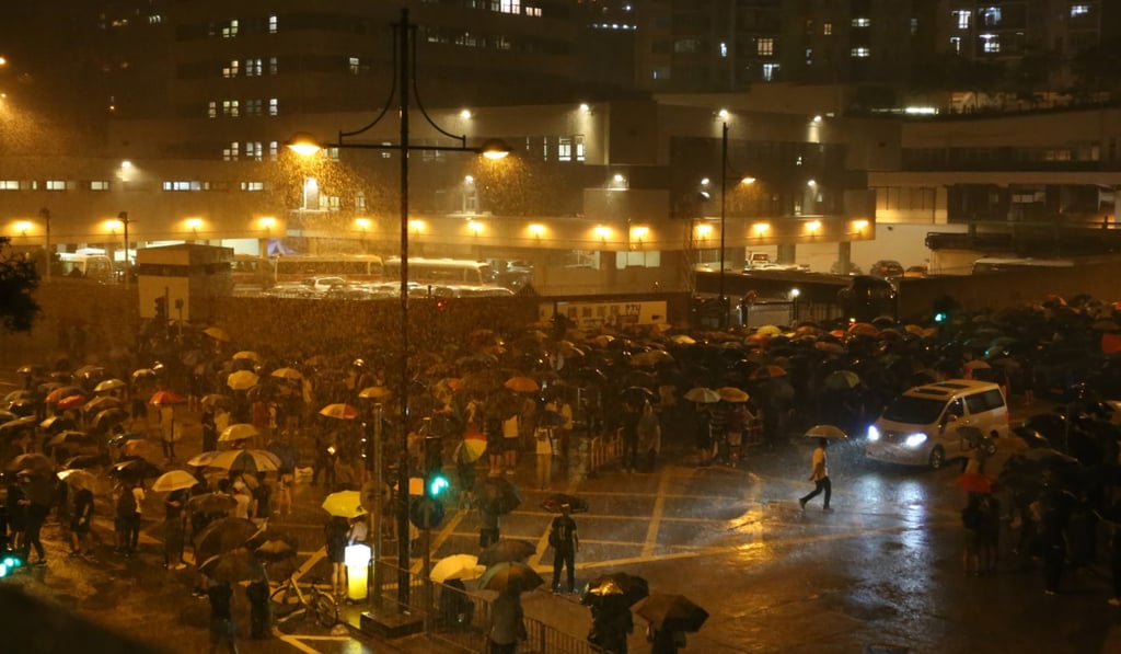 Protesters surround Kwai Chung police station. Journalists are the last to leave scenes of protest. Photo: Rachel Cheung