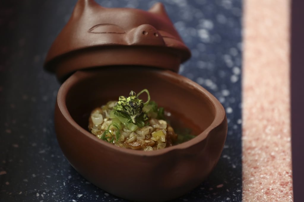 Pan-fried pig’s brains at Happy Paradise in Central, which Chan says has a playlist “that is all over the place”. Photo: Jonathan Wong