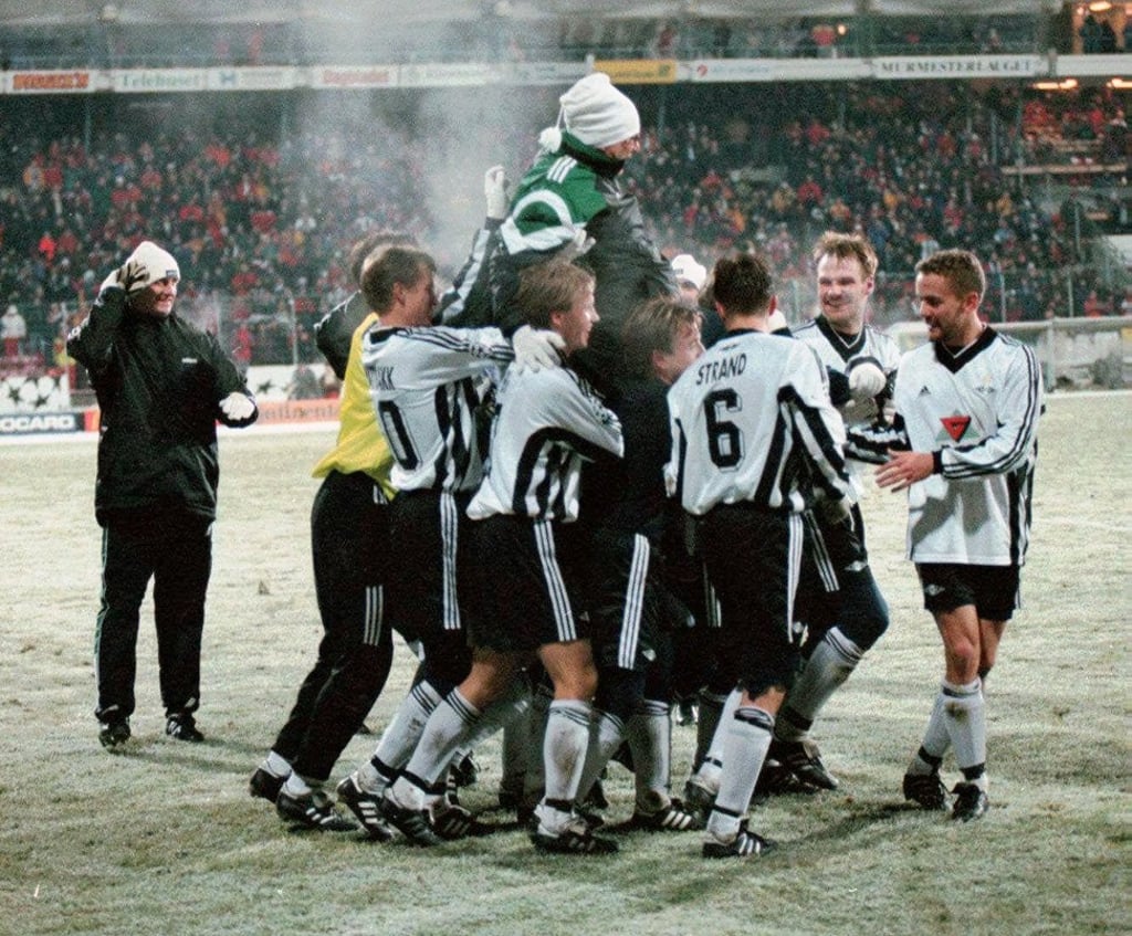 The Rosenborg team and their coach Nils Arne Eggen (top) celebrate their historic 2-0 victory over Real Madrid in the 1997 Uefa Champions League match at Lerkendal stadium. Photo: AP