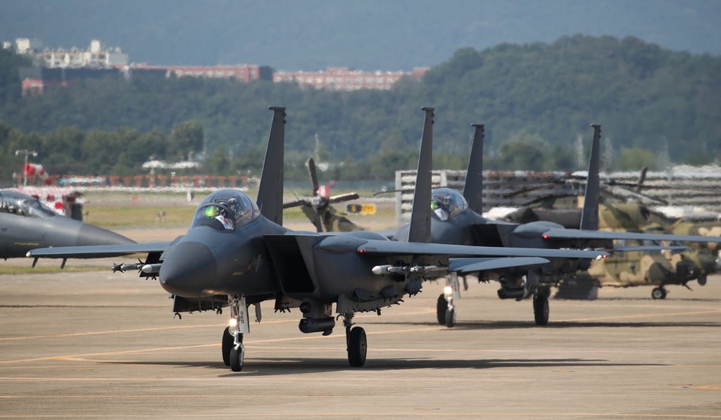 An F-15K jet patrolled over the islands claimed by both South Korea and Japan and called Dokdo in Korea and Takeshima in Japan. Photo: Bloomberg An F-15K jet patrolled over the islands claimed by both South Korea and Japan and called Dokdo in Korea and Takeshima in Japan. Photo: Bloomberg