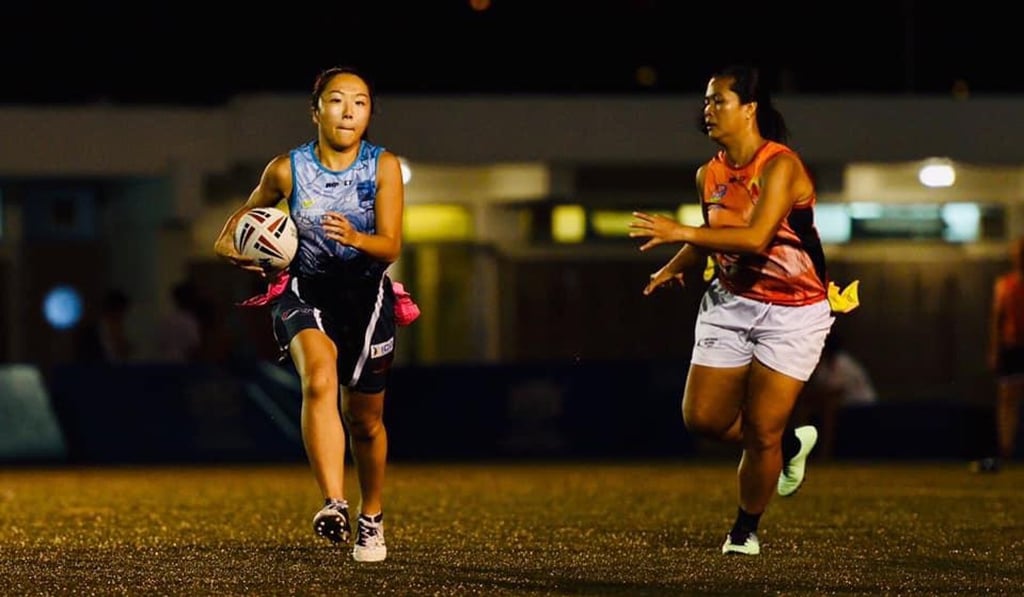 Brizuela (right) playing touch rugby in Hong Kong. Photo: Handout