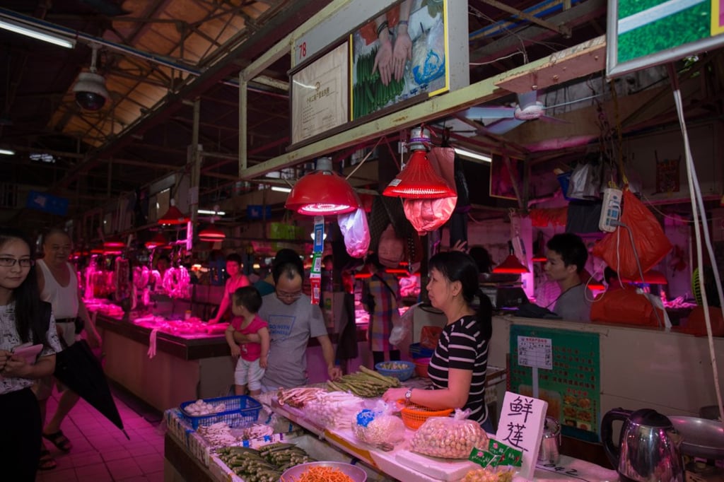 Vendors display photographs of their hands next to their stall licences as part of a 2018 art project organised by the gallery. Photo: courtesy of Fei Gallery Vendors display photographs of their hands next to their stall licences as part of a 2018 art project organised by the gallery. Photo: courtesy of Fei Gallery