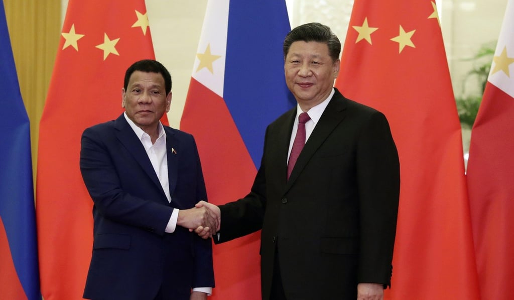 Philippine President Rodrigo Duterte (left) poses for a photo with Chinese President Xi Jinping before their meeting at the Great Hall of the People in Beijing in April 2019. Photo: AP Philippine President Rodrigo Duterte (left) poses for a photo with Chinese President Xi Jinping before their meeting at the Great Hall of the People in Beijing in April 2019. Photo: AP