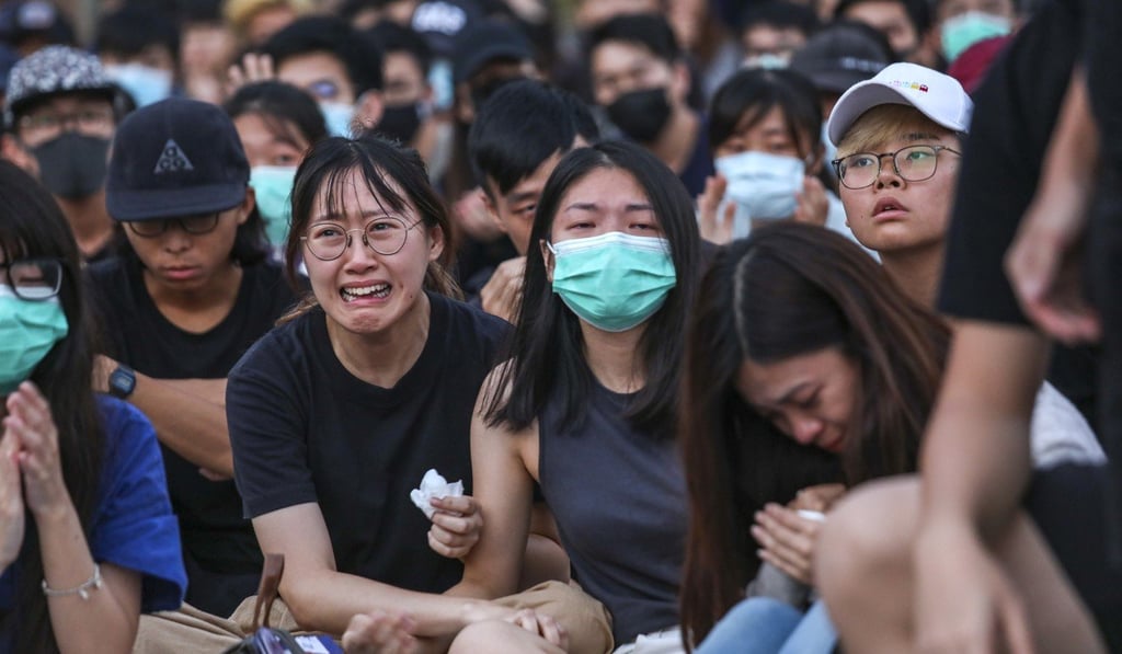 Students at Chinese University holding a rally on Thursday in support of three arrested fellow students. Photo: Xiaomei Chen