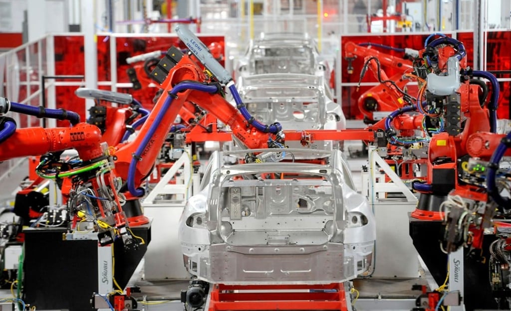 Robotic arms assemble Tesla’s Model S sedans at the company's factory in Fremont, in the US state of California. Photo: Reuters