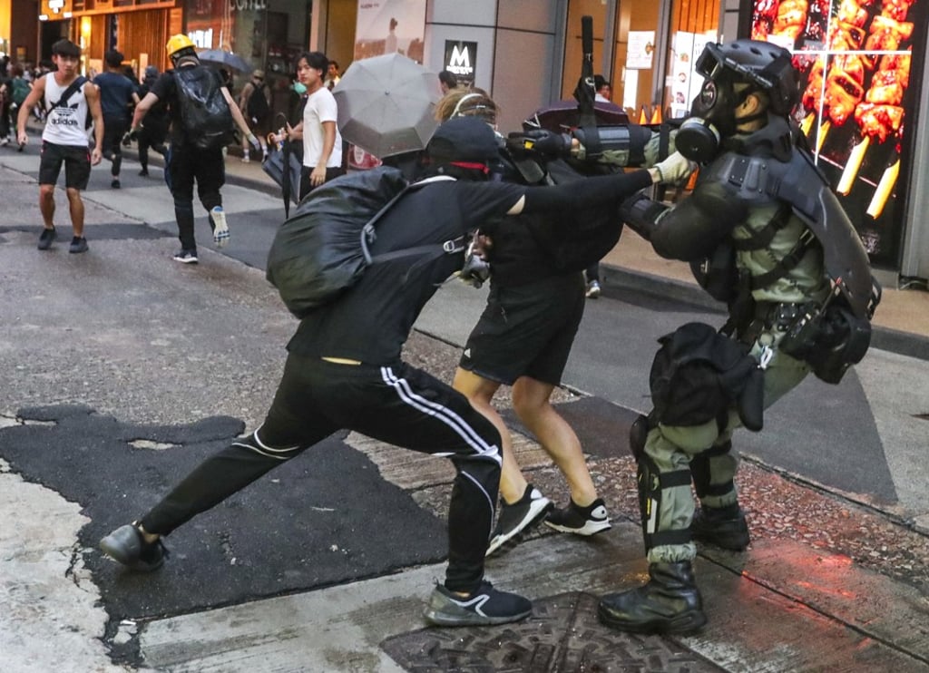 Riot police scuffle with anti-government protesters in Hong Kong on Saturday. US Senator Rick Scott has been one of the most vocal US lawmakers in favour of the demonstrations that have rattled the city for months. Photo: Jonathan Wong