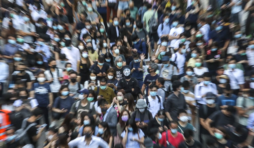 Protesters rally in Central against the new anti-mask law introduced by the government on Friday. Photo: Felix Wong