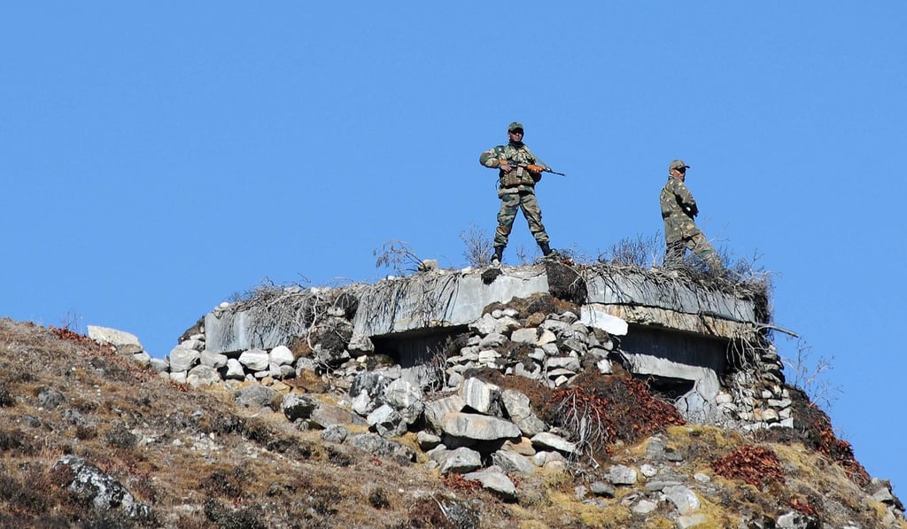 Indian army personnel keep watch at Bumla pass at the India-China border in Arunachal Pradesh. Photo: AFP