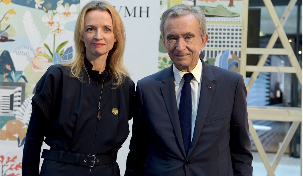 Louis Vuitton executive vice-president, Delphine Arnault (left), and its chairman and chief executive, Bernard Arnault. The LVMH boss criticised teenage climate activist Greta Thunberg as being ‘demoralising for young people.’ Photo: AFP