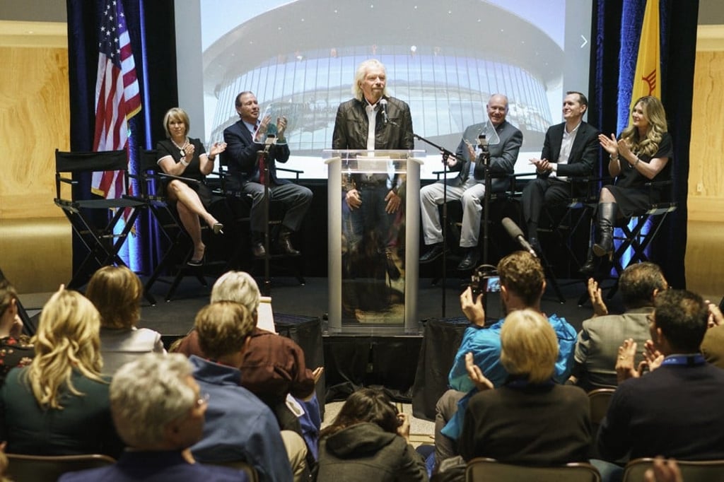 British billionaire Richard Branson, founder of Virgin Galactic, announces the company's move to a remote commercial launch and landing facility, Spaceport America, in southern New Mexico on May 10 this year. Photo: AP