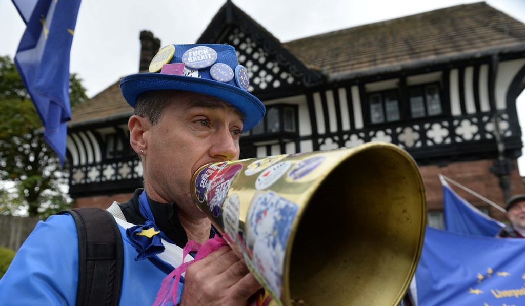 A protester demonstrates outside Thornton Manor, where Ireland’s Prime Minister Leo Varadkar met Britain’s Prime Minister Boris Johnson on Thursday. Photo: Reuters
