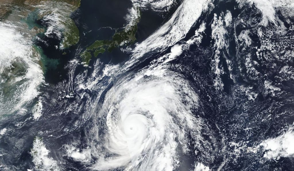 A satellite photo of Hagibis approaching Japan (top) on Tuesday. Photo: AP