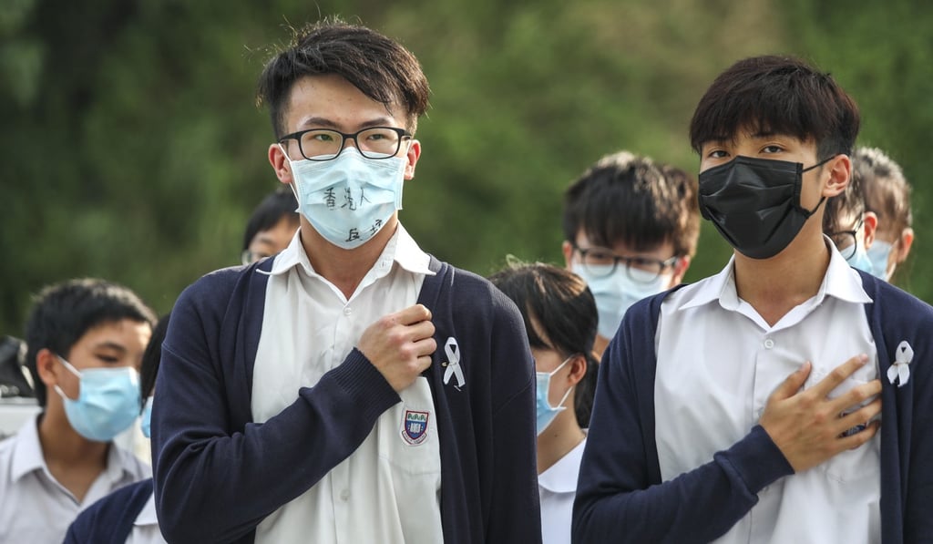 Students at Shau kei Wan Government Secondary School wear masks and hold a sit in protest. Photo: SCMP