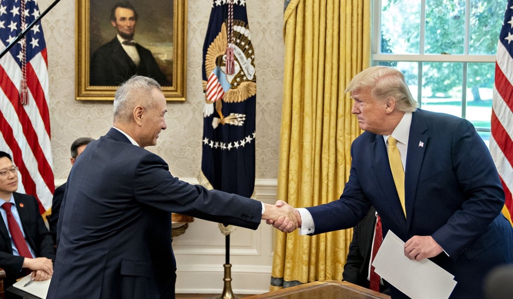 US President Donald Trump, right, shakes hands with Liu He, China's vice premier, during a meeting in the Oval Office of the White House in Washington, D.C., on Friday. Photo: Bloomberg