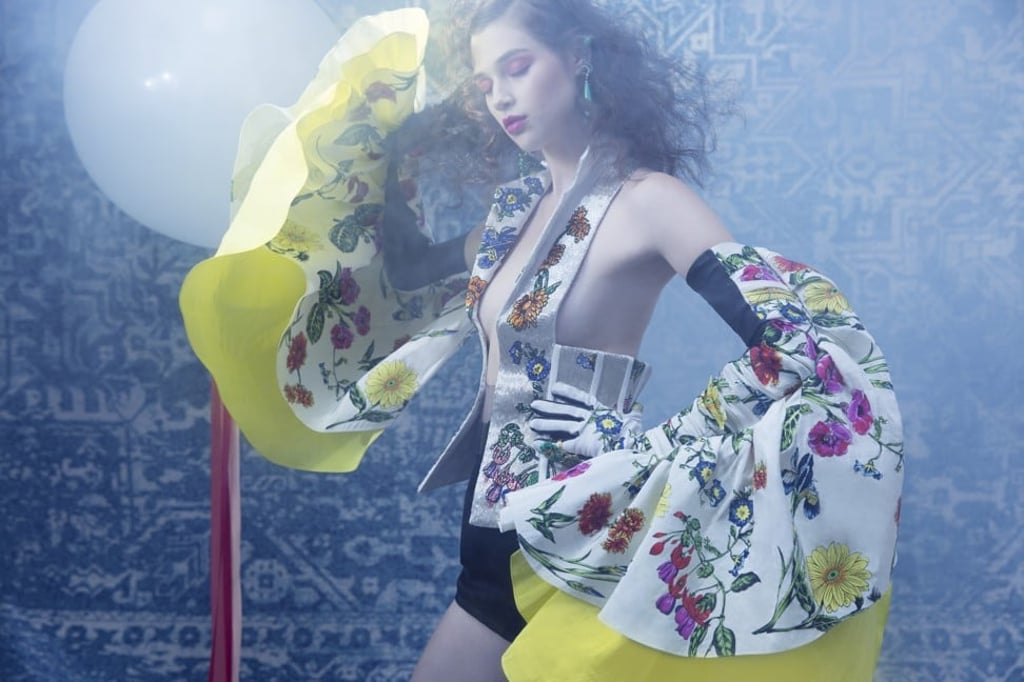 Our model wears a Schiaparelli haute couture corset, price on request; silk faille, price on request; Dundas shorts, price on request; Deborah Drattell belt, price on request; Lydia Courteille earring, HK$14,950 (US$1,906) and ring, HK$21,790 ($US2,778).