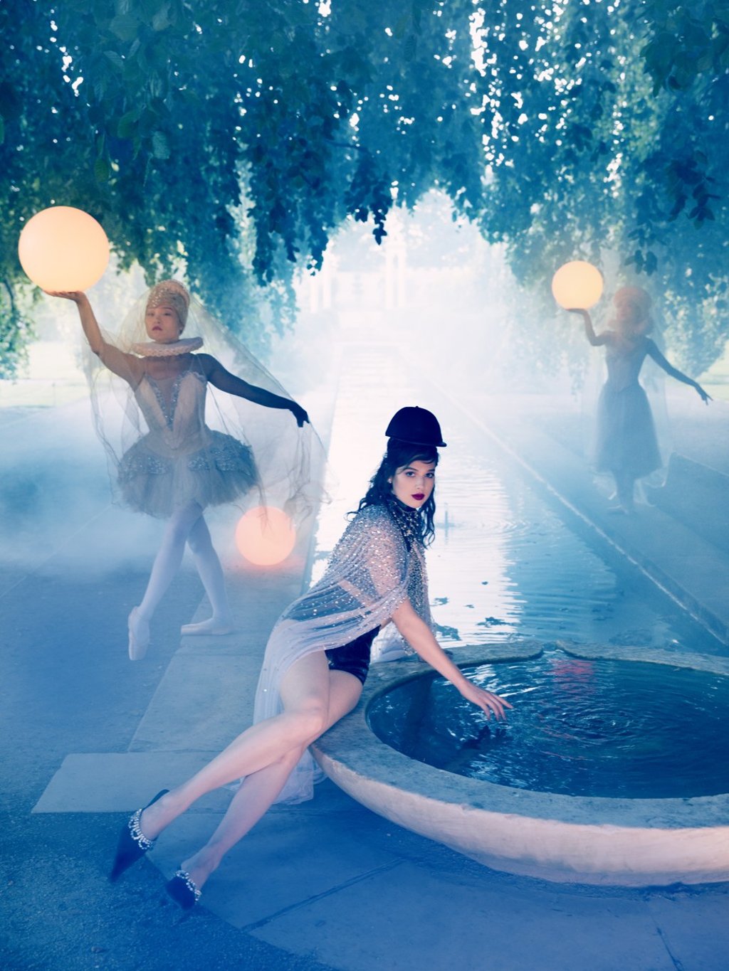 Our model is wearing: Jenny Packham cape, HK$26,280 (US$3,351); Alessandra Rich shorts, HK$5,780 (US$737); Kelsey Randall top, HK$10,520 (US$1,341); La Perla bra, price on request; JW Anderson hat, price on request; Chanel scarf, HK$14,500 ($1,849); Area shoes, HK$4,650 (US$593) and Fallon earrings, price on request.