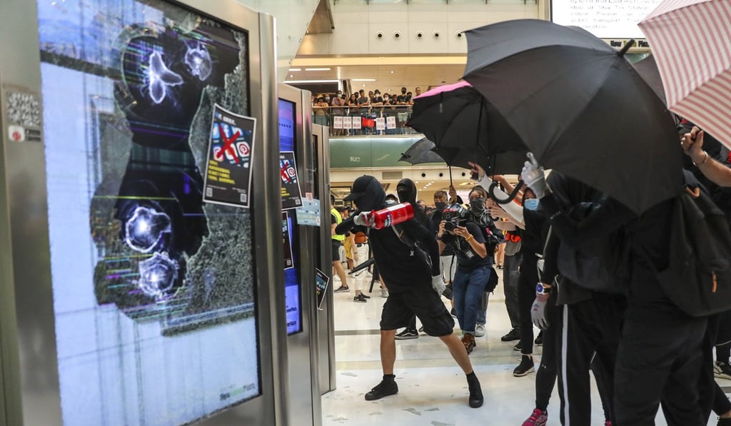 Protesters vandalise New Town Plaza in Sha Tin. Photo: Sam Tsang