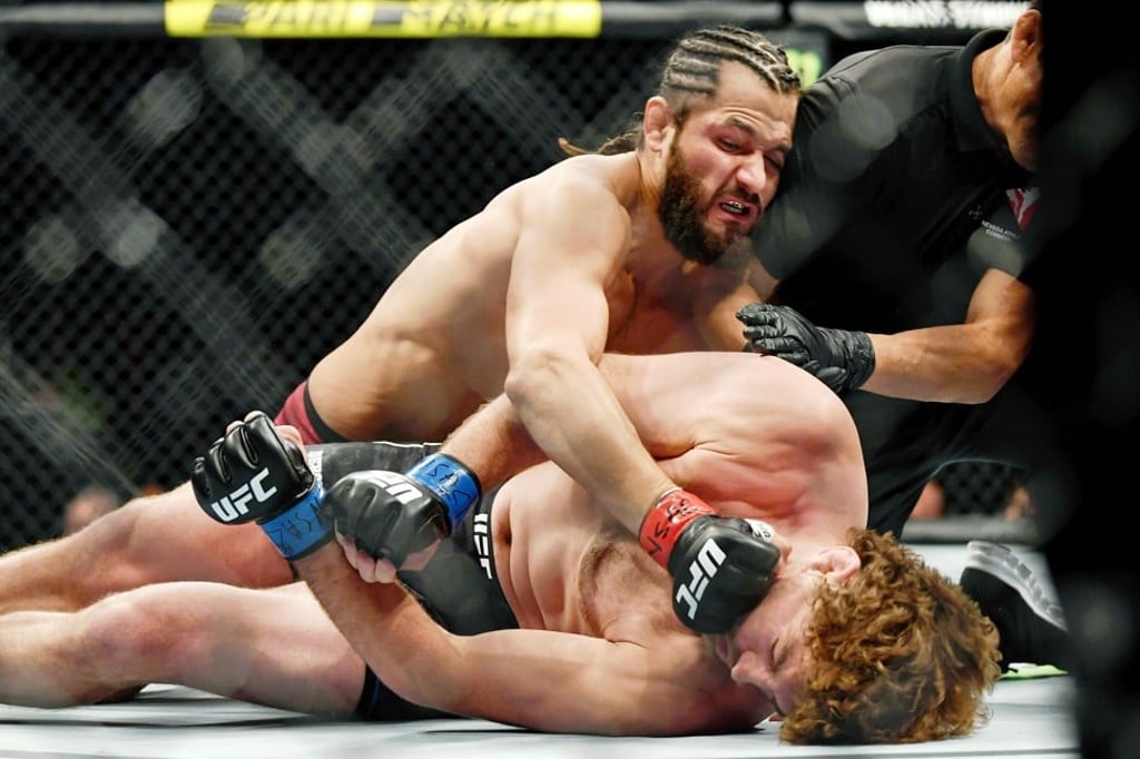 Jorge Masvidal punches Ben Askren as referee Jason Herzog stops the fight. Photo: USA Today Sports