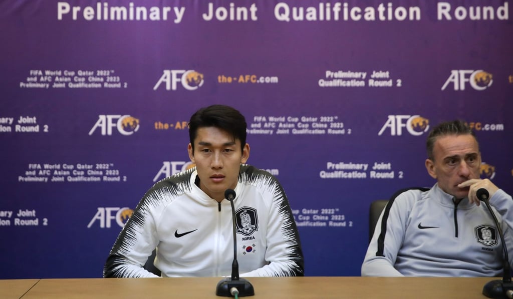 South Korean national football team player Lee Yong (left) and head coach Paulo Bento taking part in a press conference at the Kim Il-Sung Stadium in Pyongyang. Photo: AFP South Korean national football team player Lee Yong (left) and head coach Paulo Bento taking part in a press conference at the Kim Il-Sung Stadium in Pyongyang. Photo: AFP