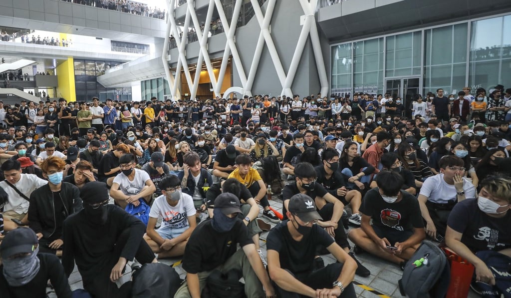 Masked students stage a sit-in at the Hong Kong Design Institute on Monday. Photo: Dickson Lee