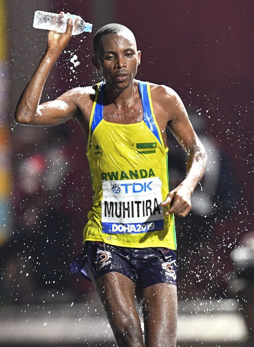 Rwanda’s Felicien Muhitira struggles in the heat in the men’s marathon at this month’s world athletics championships in Doha. Photo: EPA
