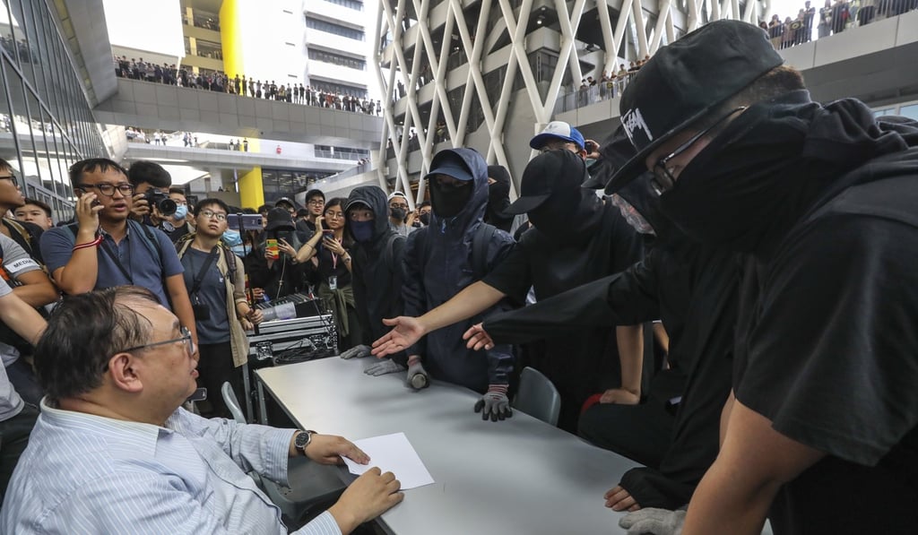 Dr Leung Hing-pong, an academic director at the design institute in Tseung Kwan O, is confronted with demands to release school footage showing the movements of a girl before her death. Photo: Dickson Lee