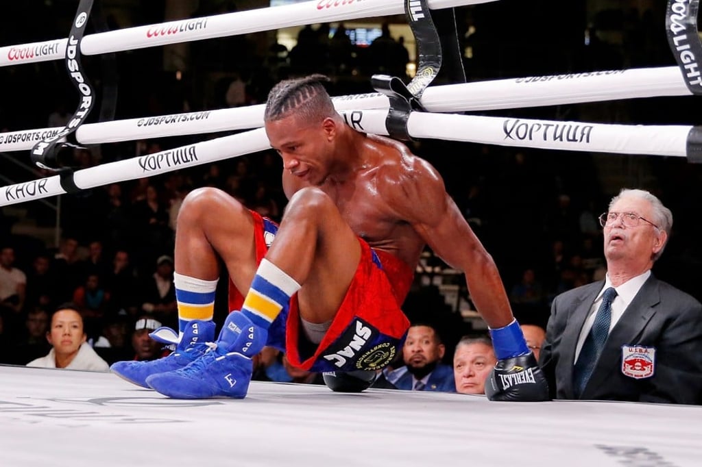 Patrick Day after getting knocked down by Charles Conwell.