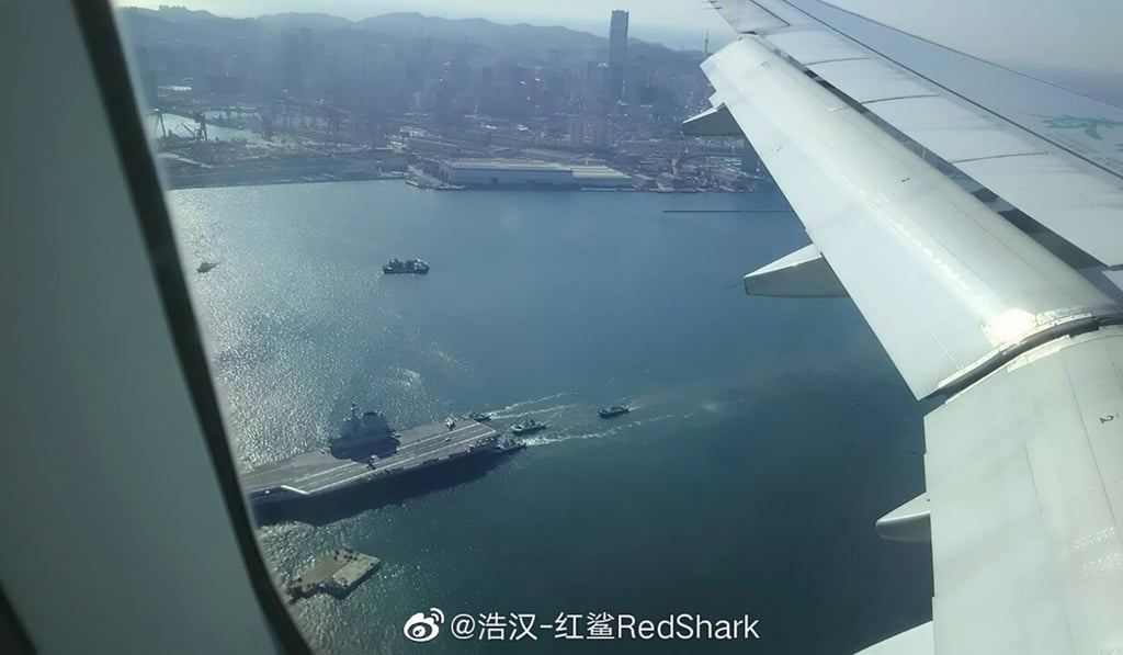 A photo shows a carrier leaving the Dalian shipyard on Tuesday. Photo: Weibo A photo shows a carrier leaving the Dalian shipyard on Tuesday. Photo: Weibo