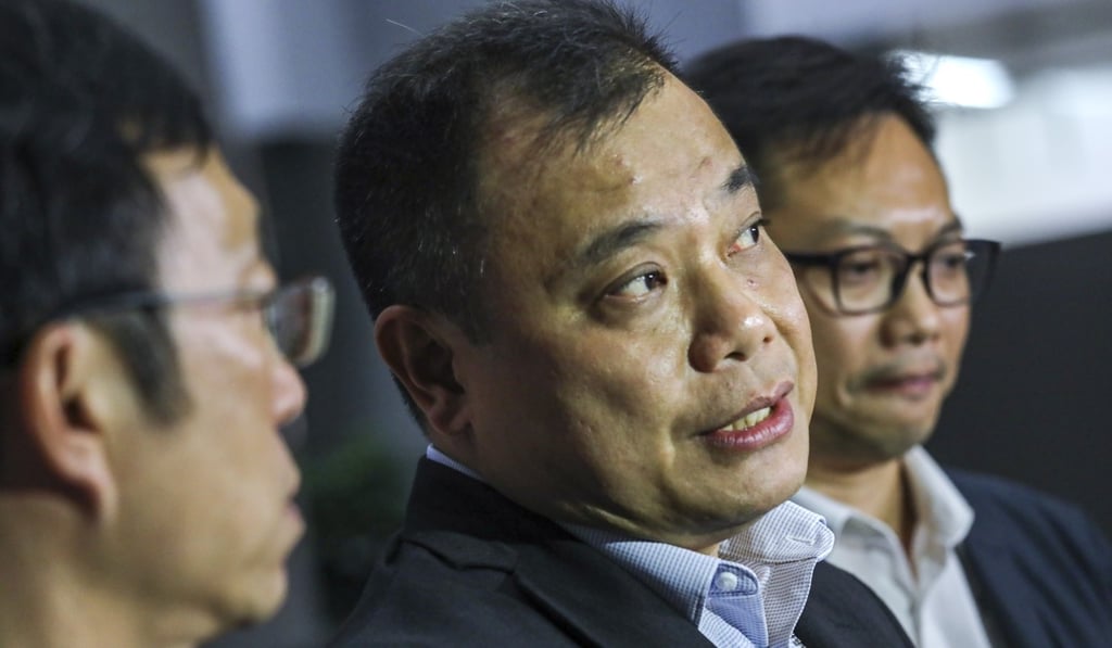 Lam Chi-wai (centre), of the Junior Police Officers’ Association, wants to see his members protected from doxxing, which involves the spread of personal information online. Photo: Dickson Lee