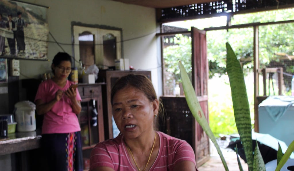 Lu Ra, who was displaced from her home in Tanghre to make way for the Myitsone project, speaks at her neighbour's home in Aung Myithar village. Photo: Oliver Slow Lu Ra, who was displaced from her home in Tanghre to make way for the Myitsone project, speaks at her neighbour's home in Aung Myithar village. Photo: Oliver Slow