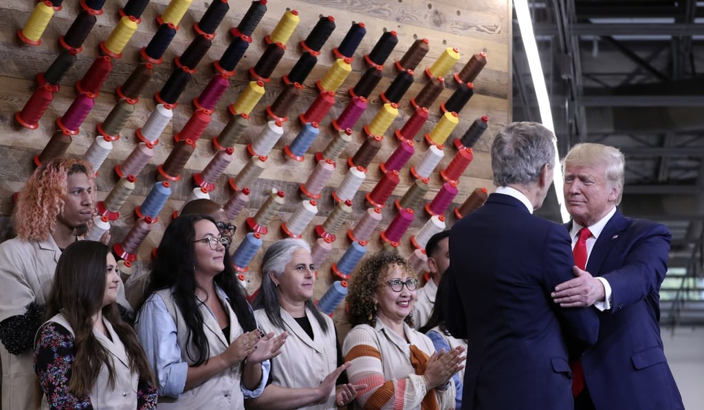 US President Donald Trump greets Bernard Arnault, chief executive of LVMH, during a ribbon-cutting ceremony at the Louis Vuitton Workshop Rochambeau in Alvarado, Texas. Photo: AP