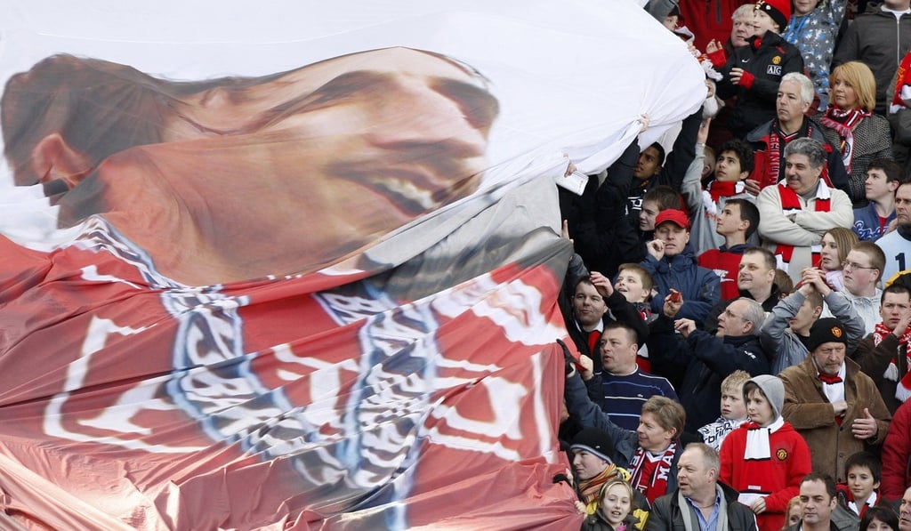 Manchester United fans display a banner of club hero Gary Neville ahead of a Liverpool clash in 2008. Photo: AP