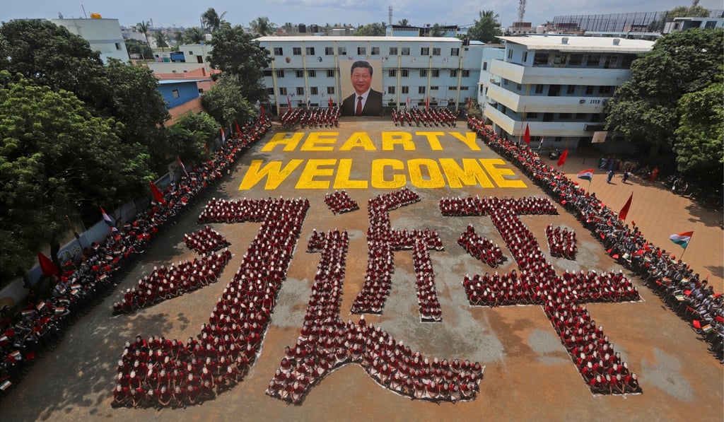 Students sit in a formation that reads ‘Xi Jinping’ before the informal summit near Chennai. Photo: Reuters