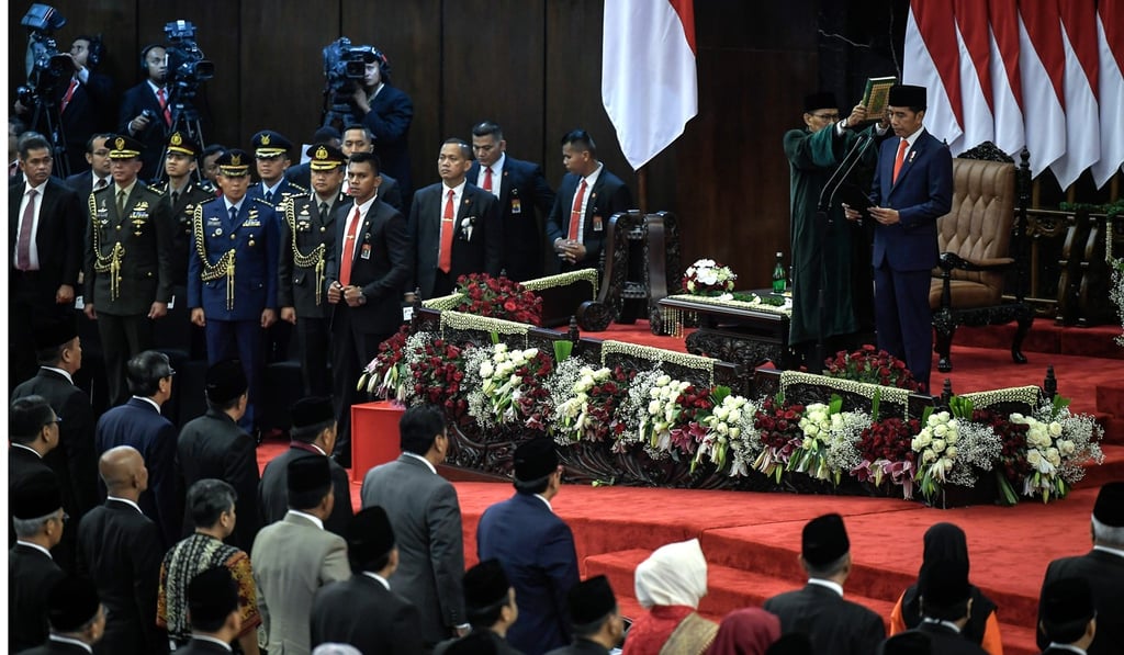 Indonesian President Joko Widodo is sworn in. Photo: DPA