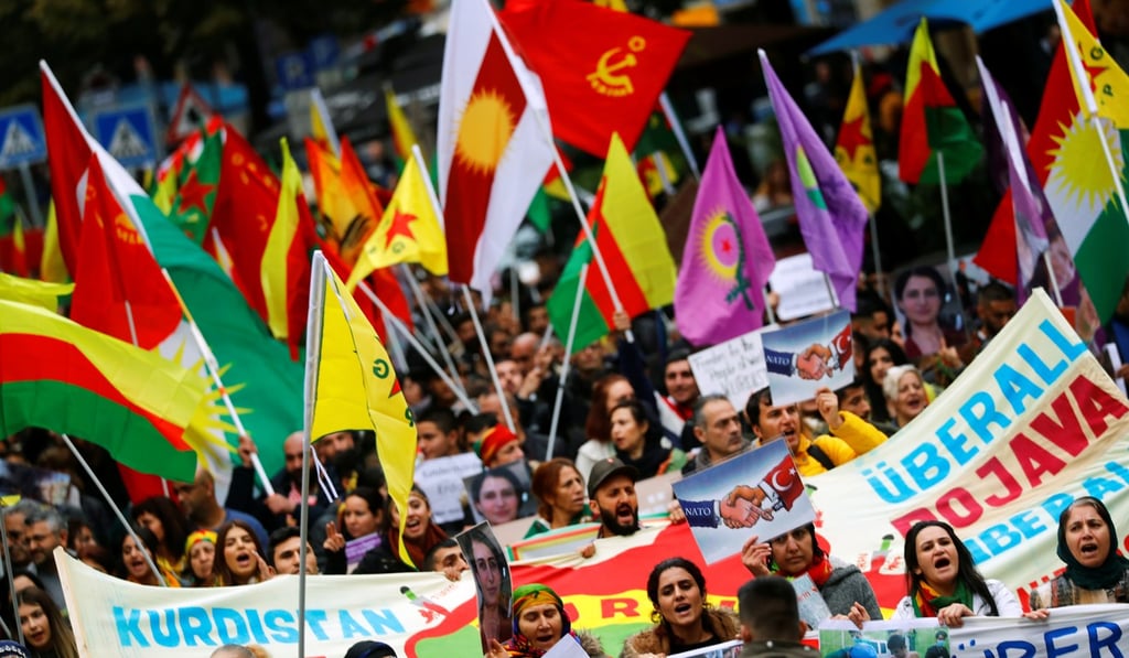 People attend a pro-Kurdish demonstration against Turkey's military action in northeastern Syria in Frankfurt, Germany. Photo: Reuters