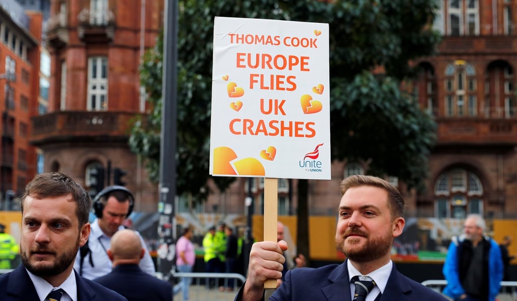 Former Thomas Cook cabin crew members protest outside the venue for the Conservative Party annual conference in Manchester, Britain. Photo: Reuters