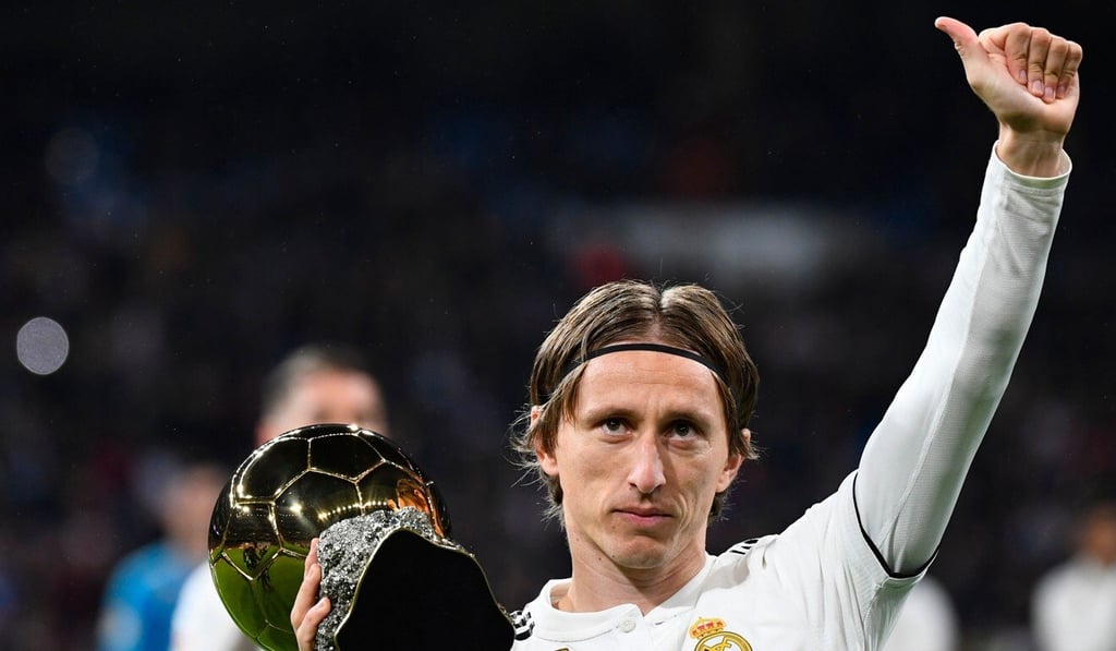Luka Modric poses with his Ballon d’Or trophy in Madrid. Photo: AFP