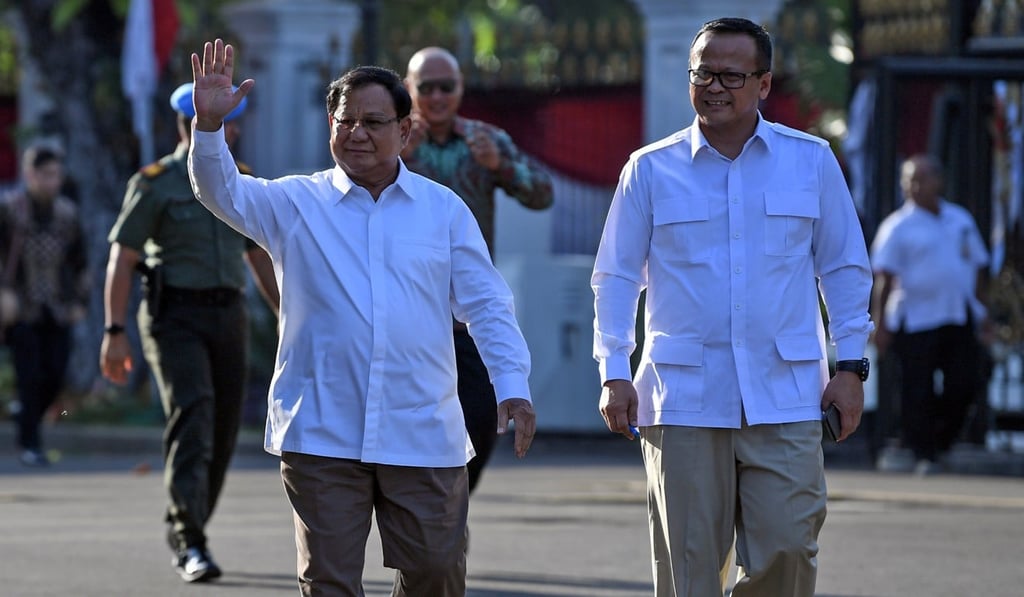 Former general and head of the Gerindra Party Prabowo Subianto, left, walks with his deputy Edhy Prabowo as they arrive at the Presidential Palace in Jakarta. Photo: Reuters Former general and head of the Gerindra Party Prabowo Subianto, left, walks with his deputy Edhy Prabowo as they arrive at the Presidential Palace in Jakarta. Photo: Reuters
