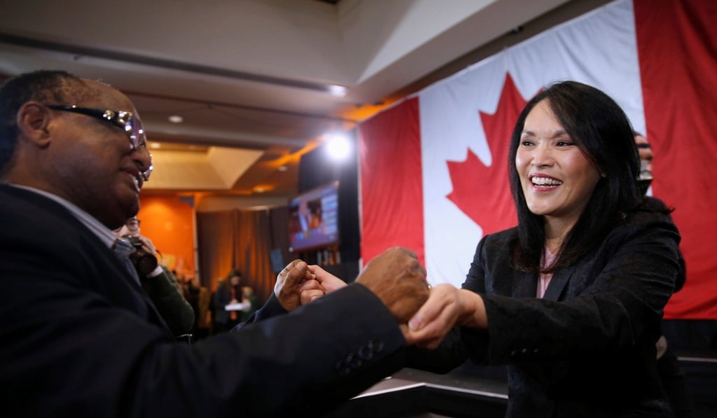 A supporter greets New Democratic Party MP Jenny Kwan in Burnaby, British Columbia, on Monday. Kwan was one of the few Canadian candidates to take a firm stance on Hong Kong’s protests, speaking at a rally in support of the movement in August. Photo: Reuters